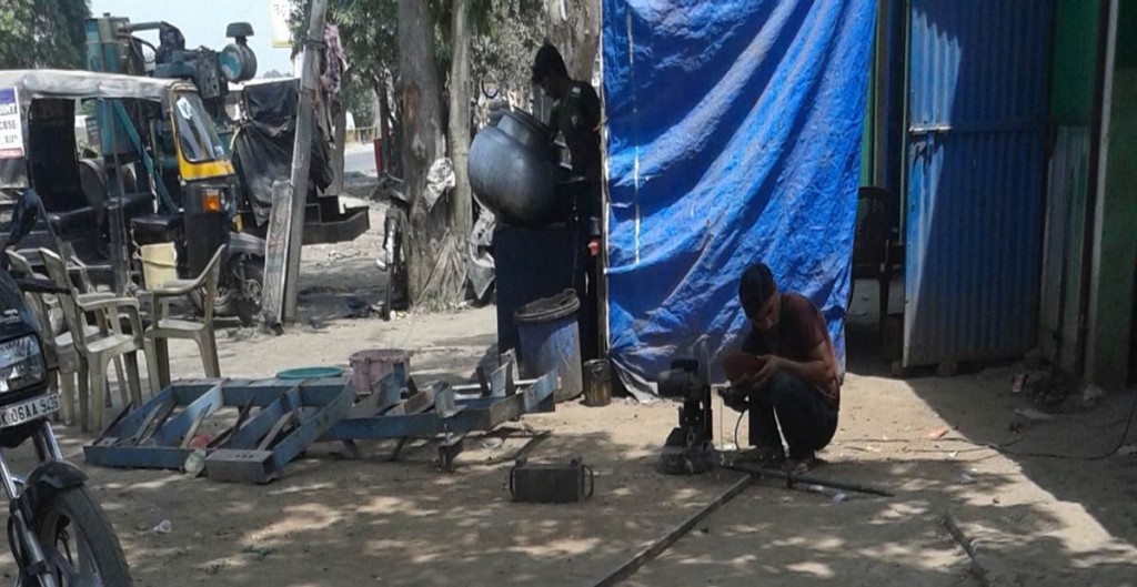 Metal Shop Near Food Stand in Rural India